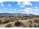 Tranquil desert landscape featuring native plants and distant mountain views providing a serene natural setting at 0 N 128Th St, Scottsdale, AZ 85255