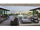 Inviting pool area with lounge chairs, patio furniture, and a desert landscape featuring a fountain at 0 N 128Th St, Scottsdale, AZ 85255