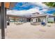 Beautiful community center featuring an outdoor lounge area with a fire pit and comfortable seating at 10050 E Texas Ave, Mesa, AZ 85212