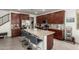 Spacious kitchen with a large island, stainless steel appliances, and ample storage at 10050 E Texas Ave, Mesa, AZ 85212