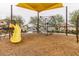 Community playground with modern climbing structures and slides in a safe, landscaped environment at 10050 E Texas Ave, Mesa, AZ 85212