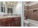 Modern bathroom featuring a soaking tub and separate toilet area at 1022 W Calypso Ct, Gilbert, AZ 85233