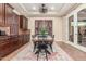 Elegant dining area with custom cabinetry, stylish chairs, and lots of light at 1022 W Calypso Ct, Gilbert, AZ 85233