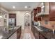 Well-appointed kitchen showcasing a gas range, stainless appliances, and ample counter space at 1022 W Calypso Ct, Gilbert, AZ 85233