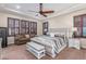 Spacious main bedroom suite with a sitting area and abundant natural light at 1022 W Calypso Ct, Gilbert, AZ 85233
