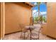 Private patio with iron table and chairs at 1022 W Calypso Ct, Gilbert, AZ 85233