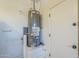 Utility room featuring a water heater at 10609 E Durant Dr, Mesa, AZ 85212