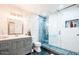 Modern bathroom with a stylish vanity, sleek fixtures, and glass shower at 11215 N 37Th Ave, Phoenix, AZ 85029