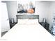 Stylish bedroom featuring a large bed with an upholstered headboard, neutral bedding, and modern bedside tables and lamps at 11215 N 37Th Ave, Phoenix, AZ 85029