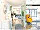 Stylish entryway with a decorated console table, tiled flooring, and a view into the adjacent living spaces at 11215 N 37Th Ave, Phoenix, AZ 85029