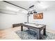 Basement featuring a pool table, modern lighting, and neutral decor, perfect for a home entertainment space at 11215 N 37Th Ave, Phoenix, AZ 85029