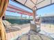 Cozy gazebo with outdoor seating, an area for grilling, and manicured landscaping at 11215 N 37Th Ave, Phoenix, AZ 85029