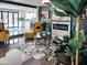 Inviting living area with stylish decor, tile floors, and a contemporary fireplace as a focal point at 11215 N 37Th Ave, Phoenix, AZ 85029