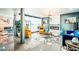 Bright living room with modern decor, tile flooring, and a stylish fireplace that creates a cozy ambiance at 11215 N 37Th Ave, Phoenix, AZ 85029