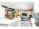 Spacious open concept living room and kitchen area with modern finishes and bright, natural light at 11215 N 37Th Ave, Phoenix, AZ 85029