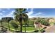 Condo property featuring palm trees, landscaping, and surrounding park at 1130 N 2Nd St # 401, Phoenix, AZ 85004