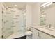 Modern bathroom featuring a glass-enclosed shower with tiled walls, sleek vanity, and modern fixtures at 1130 N 2Nd St # 401, Phoenix, AZ 85004