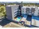 Aerial view features a private, in-ground community swimming pool, lounge area, and parking at 1130 N 2Nd St # 401, Phoenix, AZ 85004