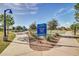 Layton Lakes community sign, park, playground and basketball court for resident enjoyment at 1179 E Regent Dr, Gilbert, AZ 85298