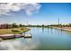 Beautiful community lake featuring multiple docks and lush landscaping, perfect for relaxation at 1179 E Regent Dr, Gilbert, AZ 85298