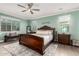 Serene main bedroom with a large bed, stylish furnishings, and plenty of natural light at 1179 E Regent Dr, Gilbert, AZ 85298