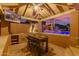 This backyard includes a covered outdoor kitchen with a dining area, a sink, and counter space at 1179 E Regent Dr, Gilbert, AZ 85298