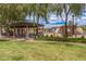 Community playground offers covered picnic tables, and climbing structures for enjoyment at 1179 E Regent Dr, Gilbert, AZ 85298