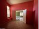 Bright room with tile floors, and an open entry to the living room at 15329 W Melissa Ln, Surprise, AZ 85374