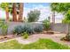 Landscaped backyard featuring a desert theme and block wall at 1609 E Williams N St, Tempe, AZ 85281