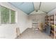 Basement space with painted walls, a window, and shelving ready for customization at 1609 E Williams N St, Tempe, AZ 85281