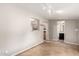 Open living space with tiled flooring, neutral walls, and recessed lighting at 1609 E Williams N St, Tempe, AZ 85281