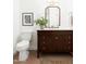Charming bathroom with a stylish vanity, hexagonal tile flooring, and updated fixtures at 1631 E Gardenia Ave, Phoenix, AZ 85020
