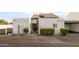 Exterior showcasing a clean facade with a gated entrance and well-maintained landscaping at 1631 E Gardenia Ave, Phoenix, AZ 85020