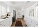 Well-equipped kitchen with modern appliances, white cabinets, and a cozy dining nook at 1631 E Gardenia Ave, Phoenix, AZ 85020