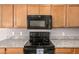 Kitchen featuring granite countertops and stainless steel appliances at 1650 S Crismon Rd # 13, Mesa, AZ 85209