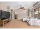Open living room with tile flooring, ceiling fan, and lots of natural light at 1650 S Crismon Rd # 13, Mesa, AZ 85209