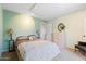 Cozy bedroom featuring soft lighting, neutral carpet, and a comfortable bed at 16510 E Palisades Blvd # 42, Fountain Hills, AZ 85268