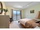 Comfortable bedroom with large sliding glass door and views of the desert mountains at 16510 E Palisades Blvd # 42, Fountain Hills, AZ 85268