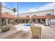 Community hot tub area with chairs and tables at 16510 E Palisades Blvd # 42, Fountain Hills, AZ 85268