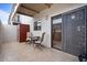 Cozy patio with tile flooring, seating, and convenient access to the interior through sliding glass doors at 16510 E Palisades Blvd # 42, Fountain Hills, AZ 85268