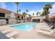 Beautiful community pool area with lots of lounge chairs and well-maintained landscaping at 16510 E Palisades Blvd # 42, Fountain Hills, AZ 85268