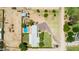 Aerial view showcases the property with pool, garden, ample land, and a serene, private setting at 18051 E Happy Rd, Queen Creek, AZ 85142
