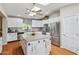 Kitchen featuring skylights, stone countertops and stainless steel appliances at 18051 E Happy Rd, Queen Creek, AZ 85142