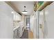 Functional laundry room equipped with washer, dryer, sink, and built in cabinets at 18051 E Happy Rd, Queen Creek, AZ 85142