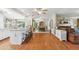 Open-concept living space with hardwood floors and lots of natural light at 18051 E Happy Rd, Queen Creek, AZ 85142