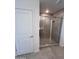 Tiled shower with a glass door at 18183 W Larkspur Dr, Goodyear, AZ 85338