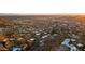 Aerial view of a neighborhood nestled in the mountains, showcasing lush landscapes and unique residential architecture at 1836 E Turquoise Ave, Phoenix, AZ 85020