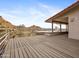 Spacious outdoor deck offers stunning views and space for entertaining under a covered roof at 1836 E Turquoise Ave, Phoenix, AZ 85020