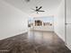 Stylish bedroom featuring a ceiling fan and mountain views through picture windows at 1836 E Turquoise Ave, Phoenix, AZ 85020