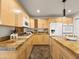 Beautiful kitchen with custom cabinets, stone countertops, and modern appliances at 1836 E Turquoise Ave, Phoenix, AZ 85020